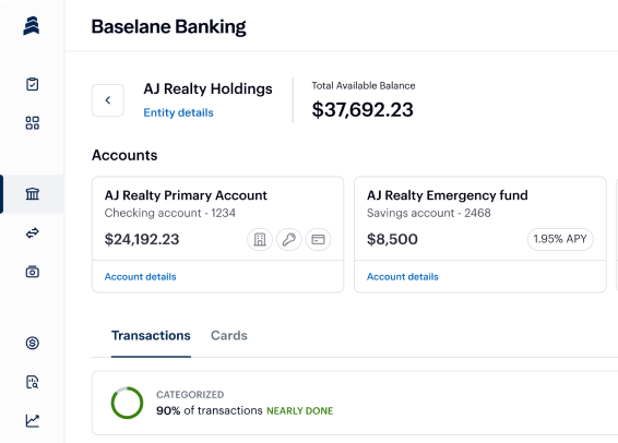Screenshot of a Baseline Banking dashboard for AJ Realty Holdings. Displays the total available balance of $37,692.23, account balances, and categorized transactions. AJ Realty Primary Account has $24,192.23, and AJ Realty Emergency Fund Savings Account has $8,500.